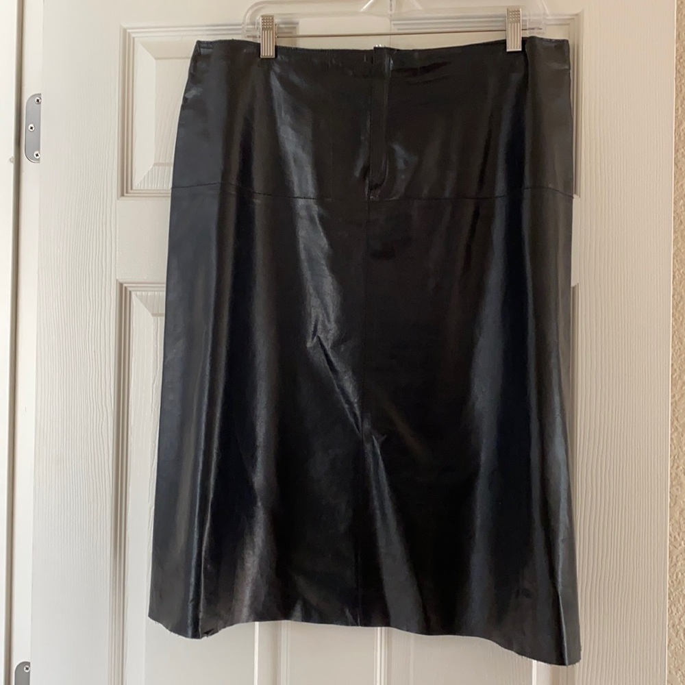 Black leather skirt 26.5" long waist is 18" wide